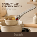 304 stainless steel narrow-gap kitchen tongs in a warm kitchen scene