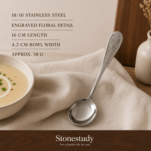 Engraved 18/10 stainless steel round spoon in a dining setting