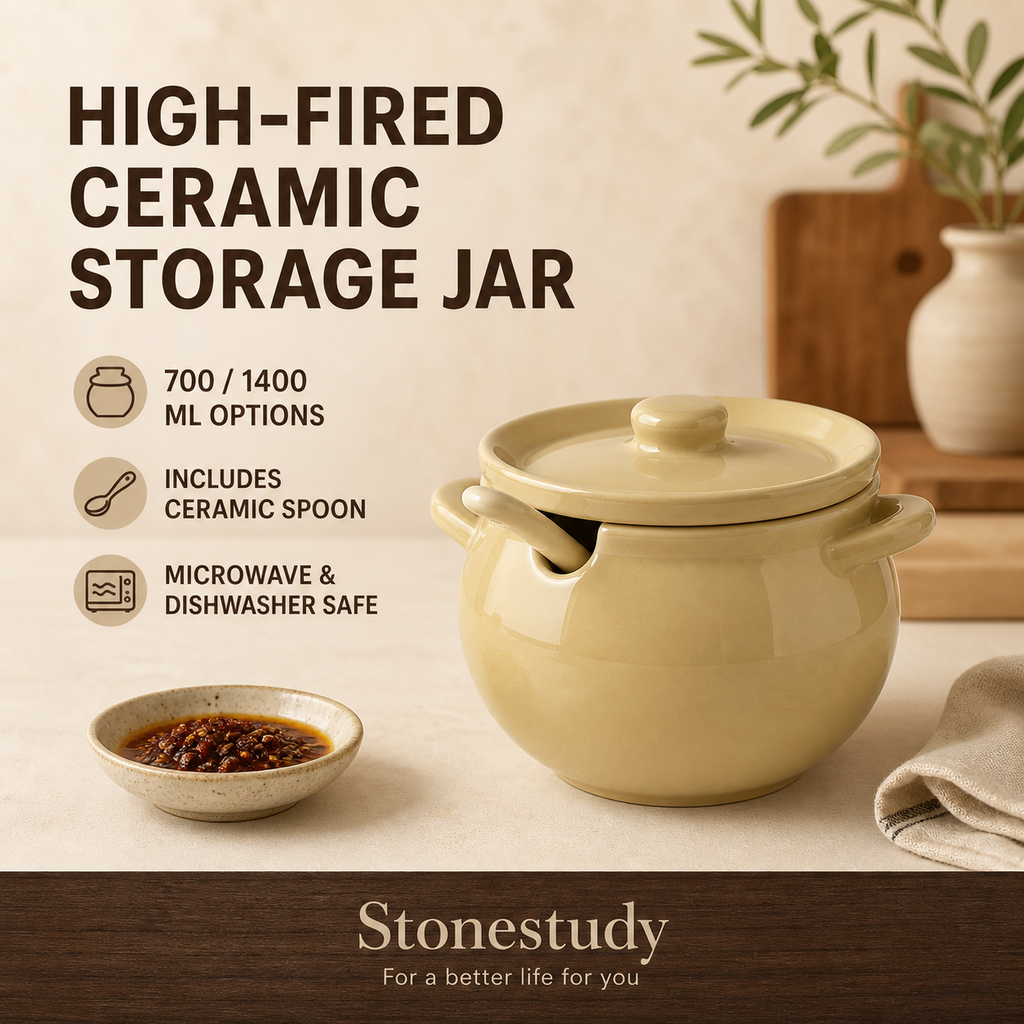 Yellow high-fired ceramic storage jar with lid and spoon